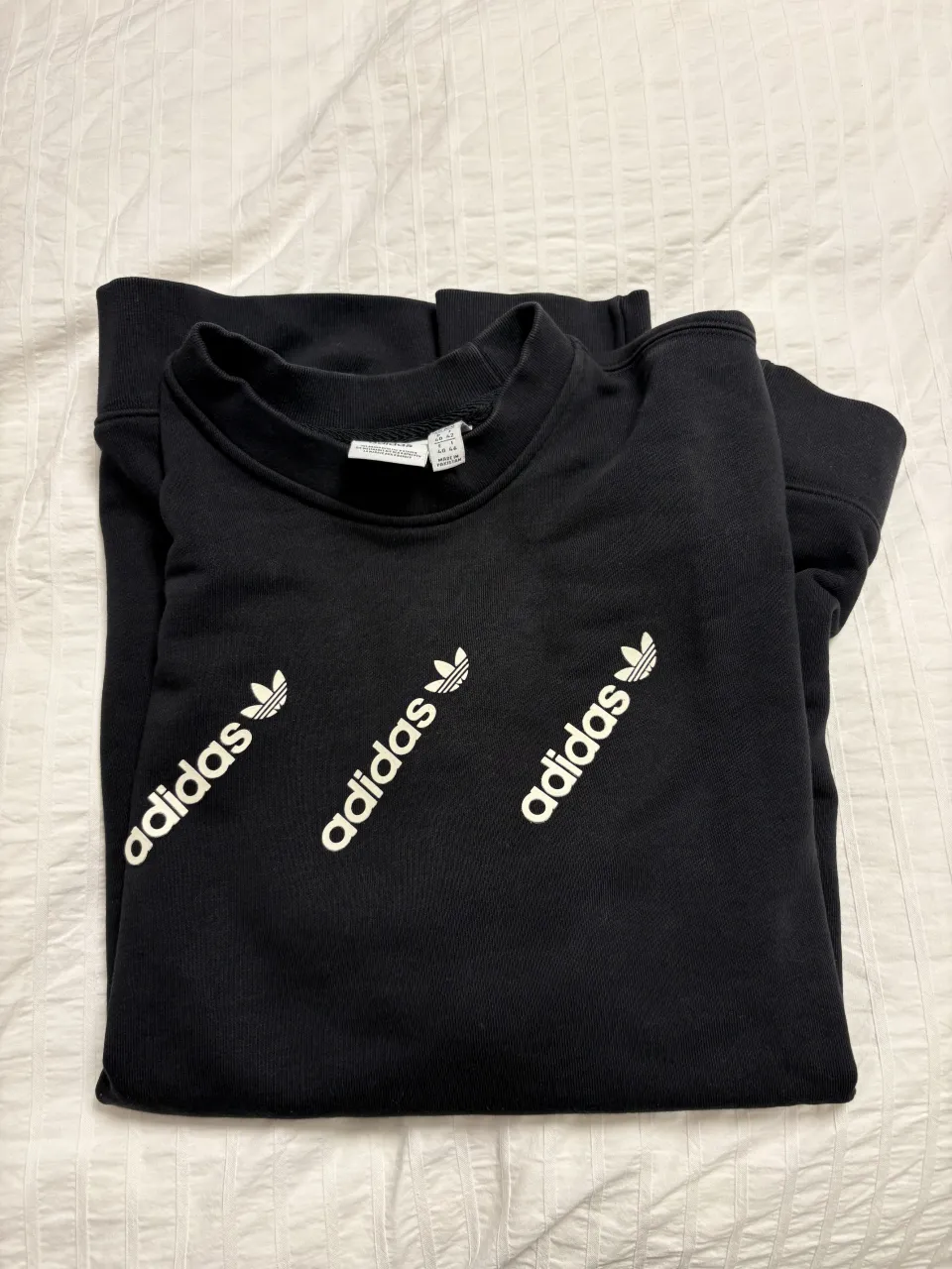 Buzo adidas