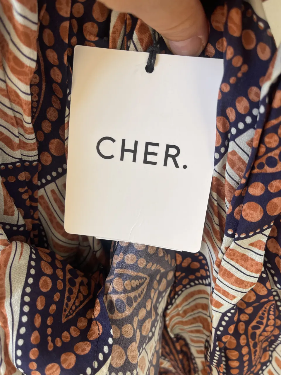 Top CHER. - Vista 3