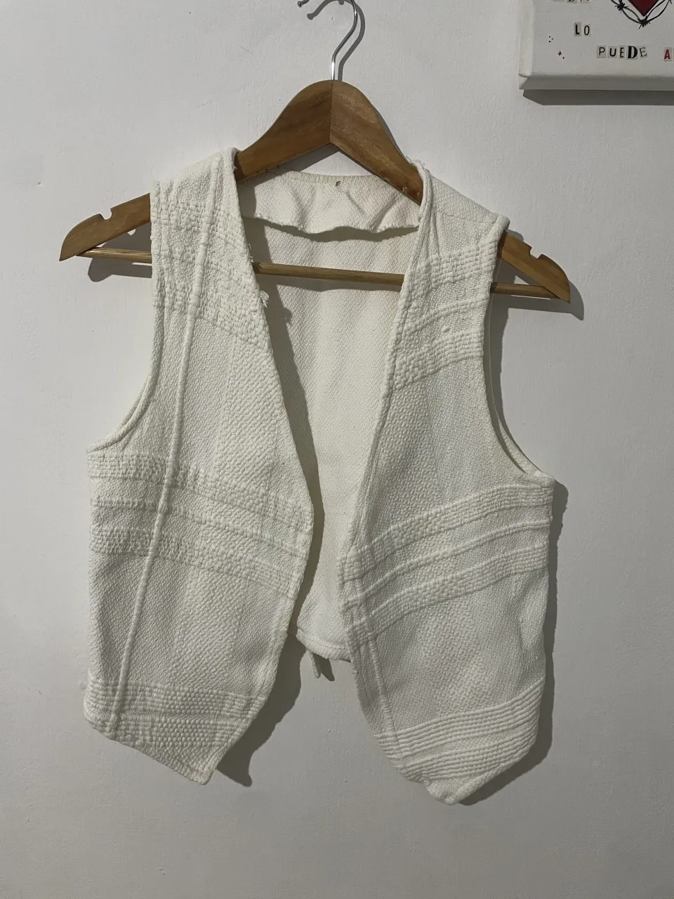 Chaleco sastrero
tiene esas manchitas que salen en las fotos