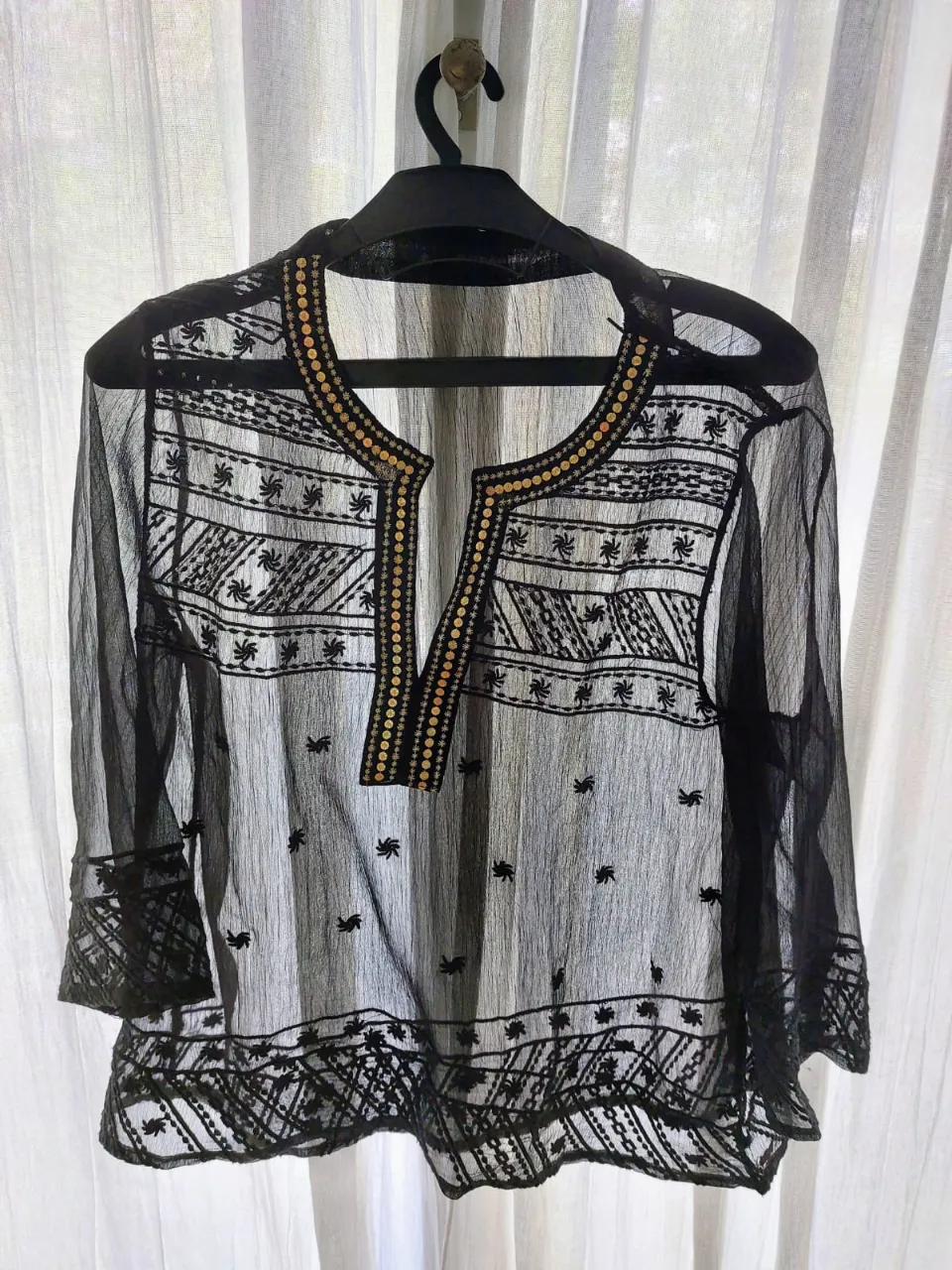 Blusa Ninguna