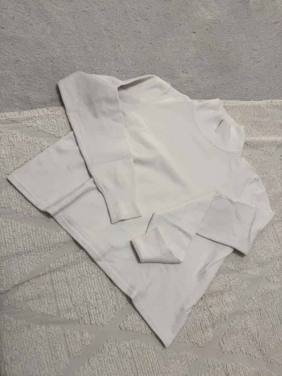 Sweater de bremer de manga larga con cuello alto.