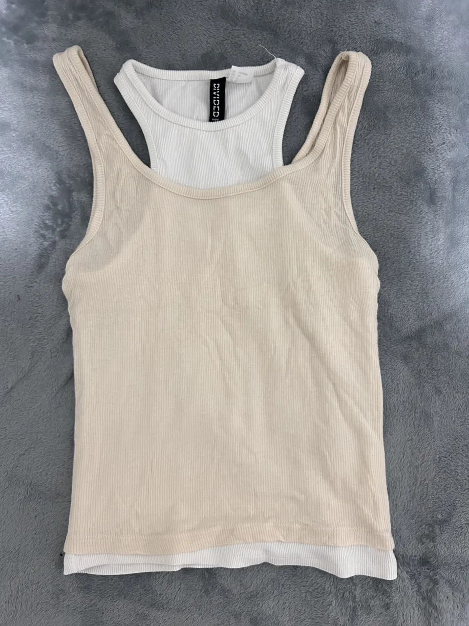 Musculosa Divided - imagen 1
