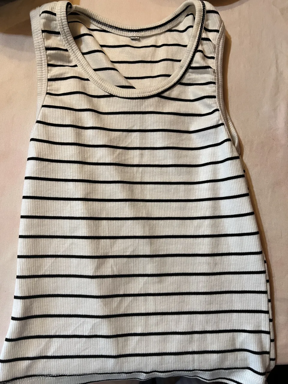 Musculosa A ≠