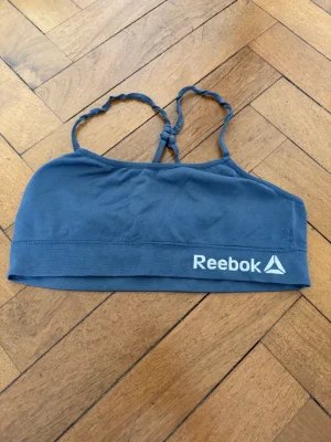 Reebok · Talle L